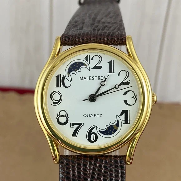Vintage Majestron Moon Phase Gold Watch Day Night Rotating Windows Vintage Majestron Gold Tone Moon Phase Quartz Date Pocket  main image 3